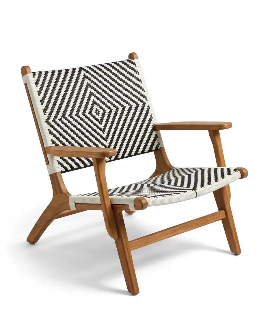 Lounge armchair with black-and-white geometric woven seat and back, three-quarter view